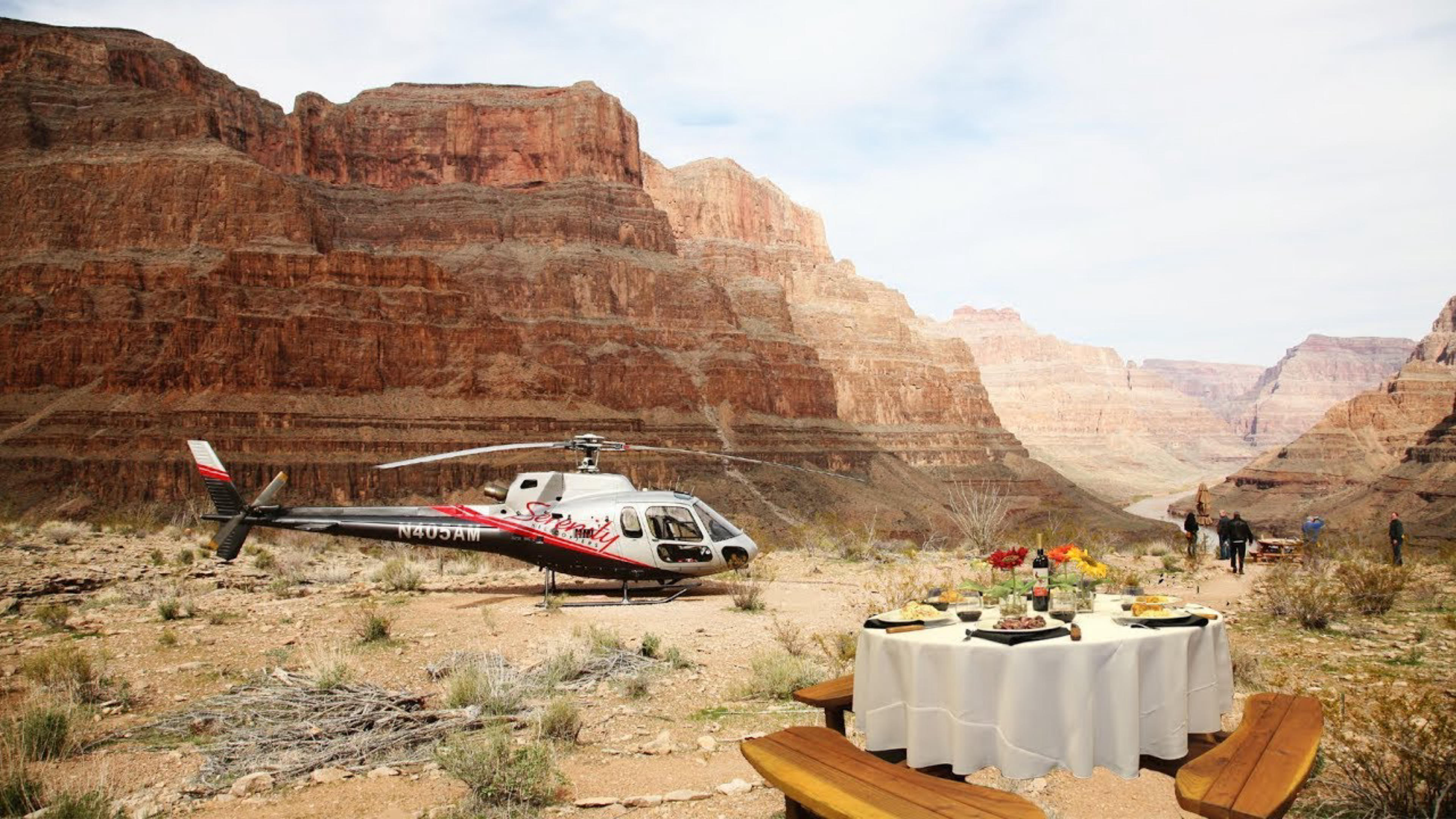 undefined A helicopter tour with dinner table setup in Grand Canyon by Viator - a tour agency offering tours around Las Vegas, NV
